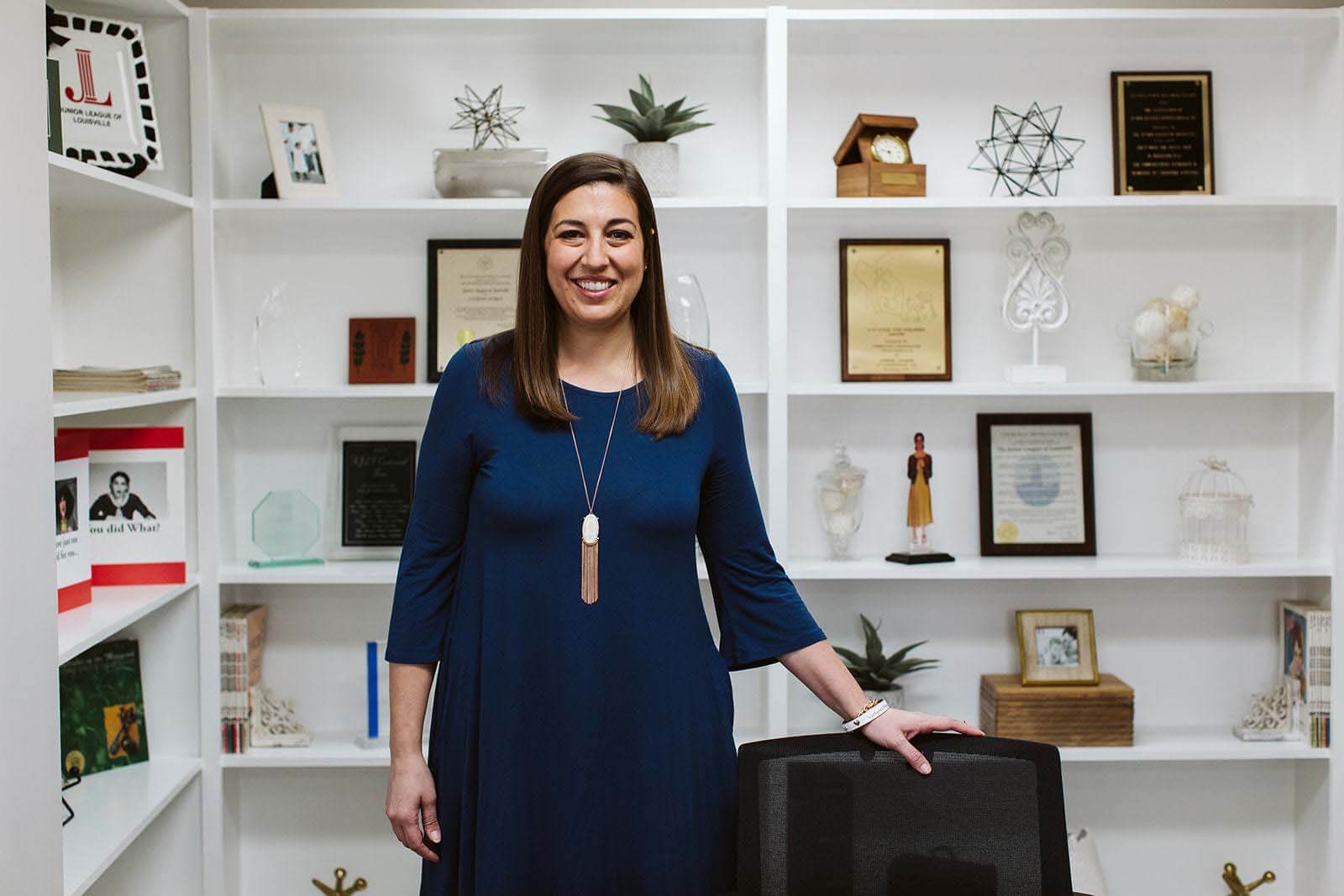 The Junior League of Louisville recently moved into a new office, and Jessica is proud the organization finally has a place to call home. Jessica posing in JLL's new office