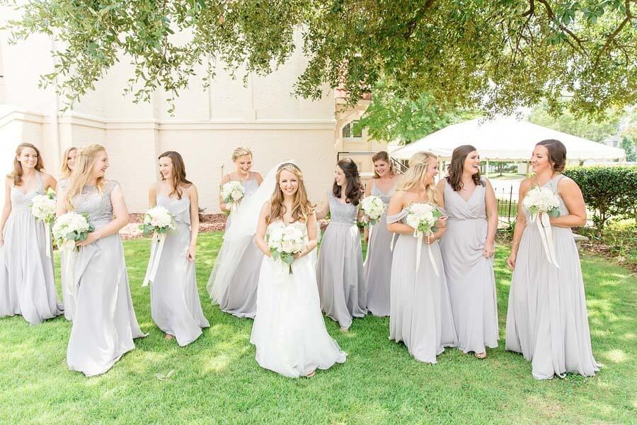 Hope and bridesmaids with neutral flowers