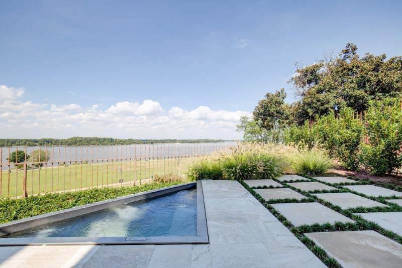 Hot tub in backyard of South Bluffs home