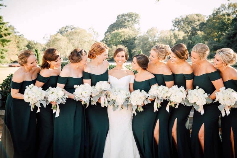 Bride with bridesmaids in green dresses