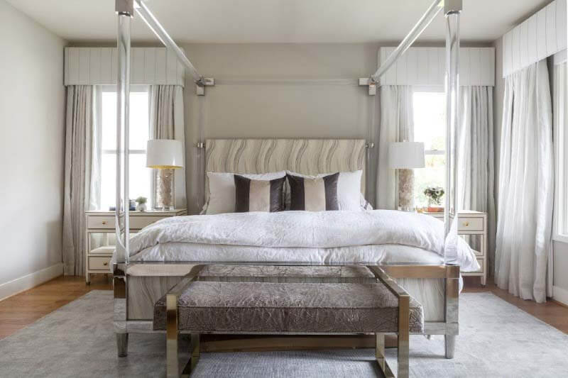 “The motorized drapery panels are operable from smartphones, which makes it easy to open and close while lounging in bed,” says Abbe Fenimore, founder and interior designer of Studio Ten 25. Image: Heather Hawkins Soothing Southern bedroom designed by Studio Ten 25