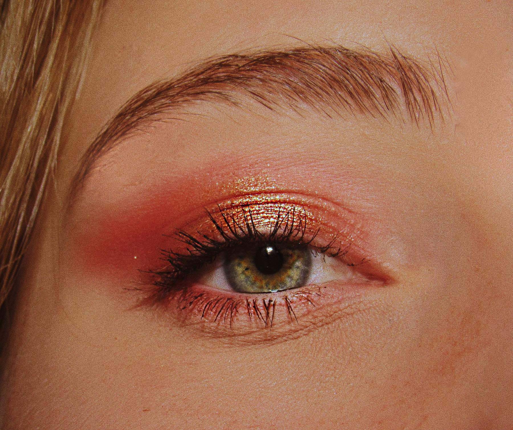 Spring makeup with metallic orange eye shadow
