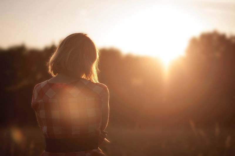 Times are tough right now, but Dawn Kirk and Dr. William Freeman remind us how to take care of our mental health. Woman standing in field at dusk