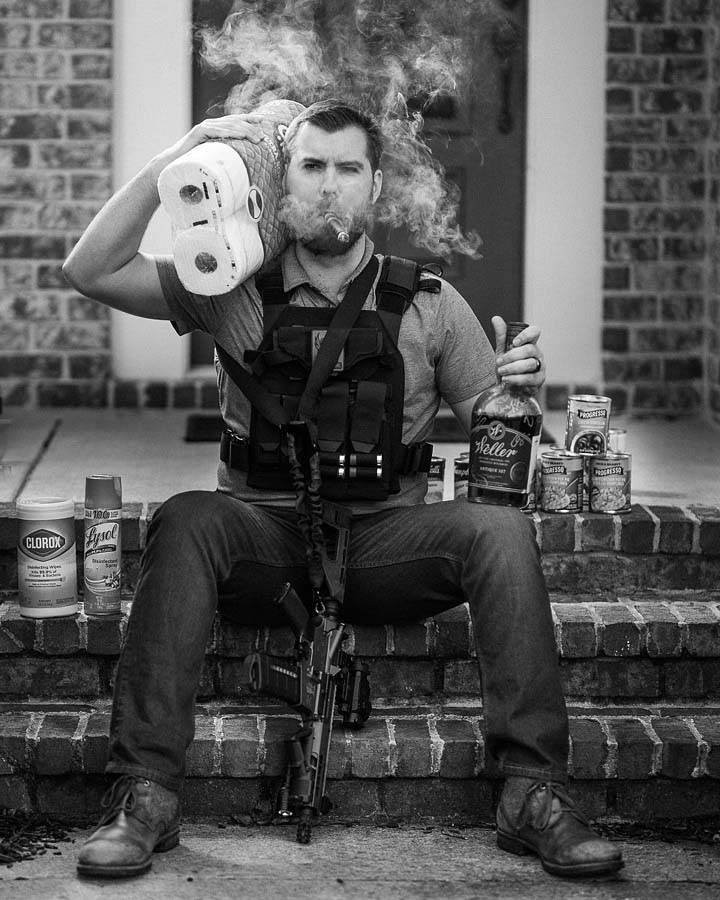 Man with a cigar, toilet paper and whiskey and canned goods. Image: Tausha Dickinson
