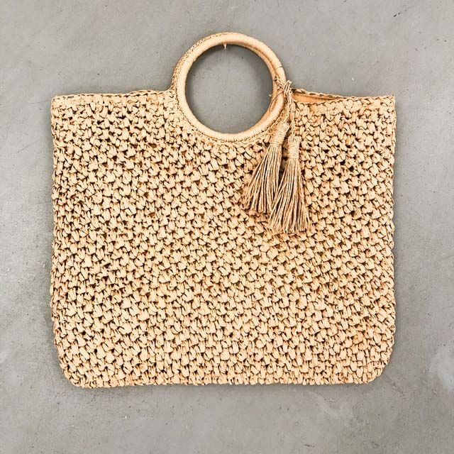 Straw bag, $39 + free shipping on orders over $75, at Moda Boutique | Image: Moda Boutique Straw woven bag from Moda Boutique