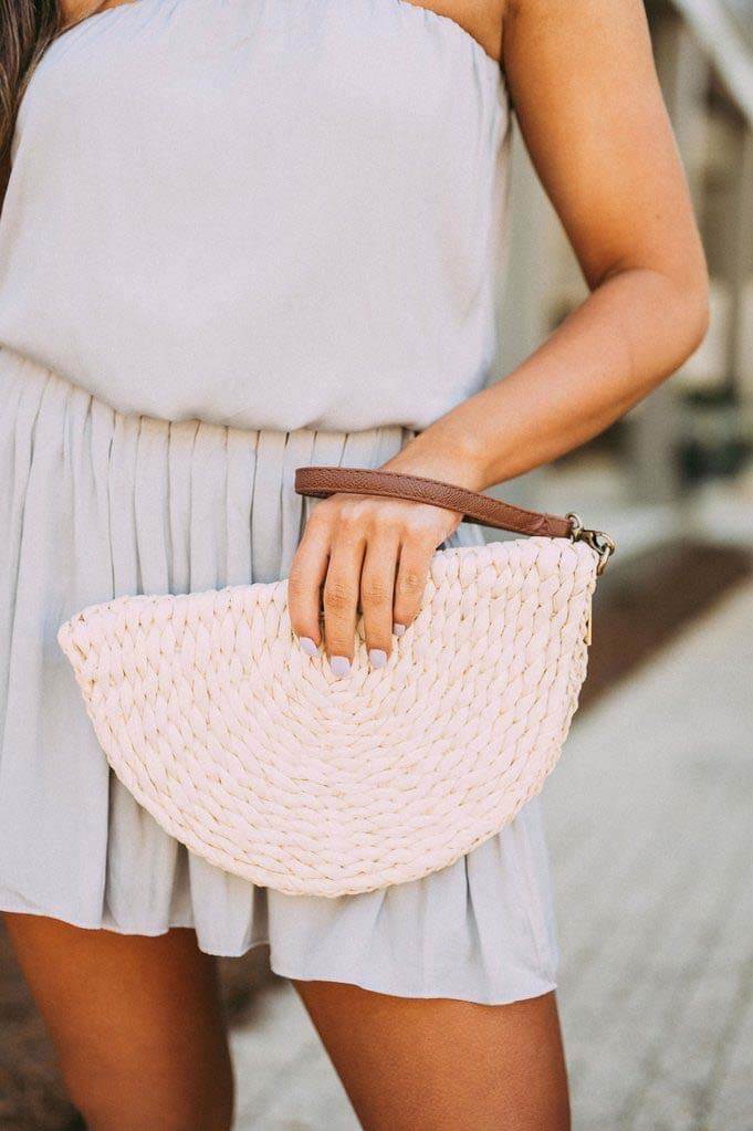 Straw clutch, $48 + free shipping in the U.S., at These Three Boutique | Image: These Three Boutique Straw bag from These Three Boutique