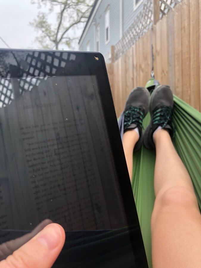 A little hammock hang with a great book is a great way to escape to some alone time, Emma says. Image: Submitted Quarantine cohiting tips - hammock and book