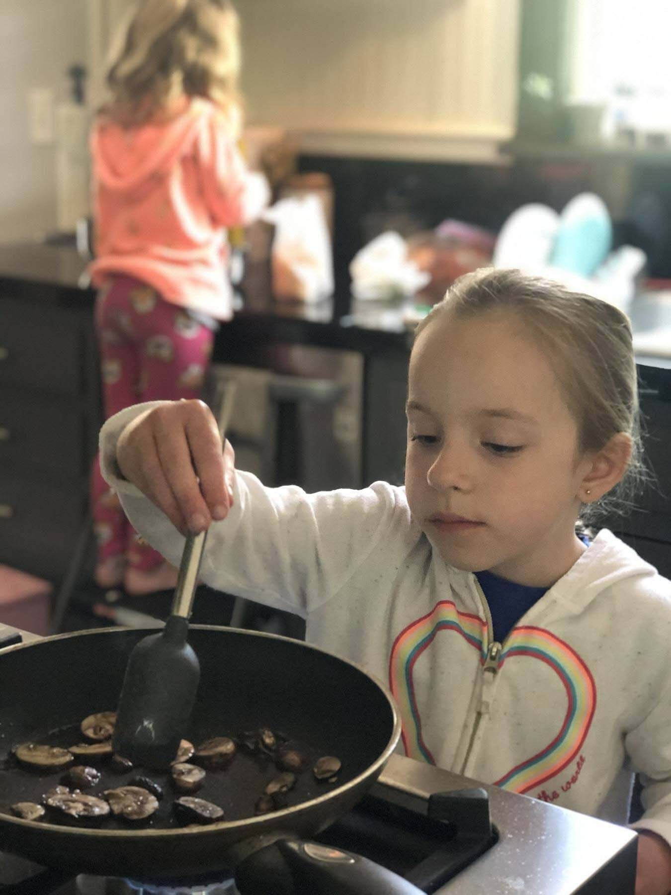 Gray cooking mushrooms to make omelet, proving quarantine home economics