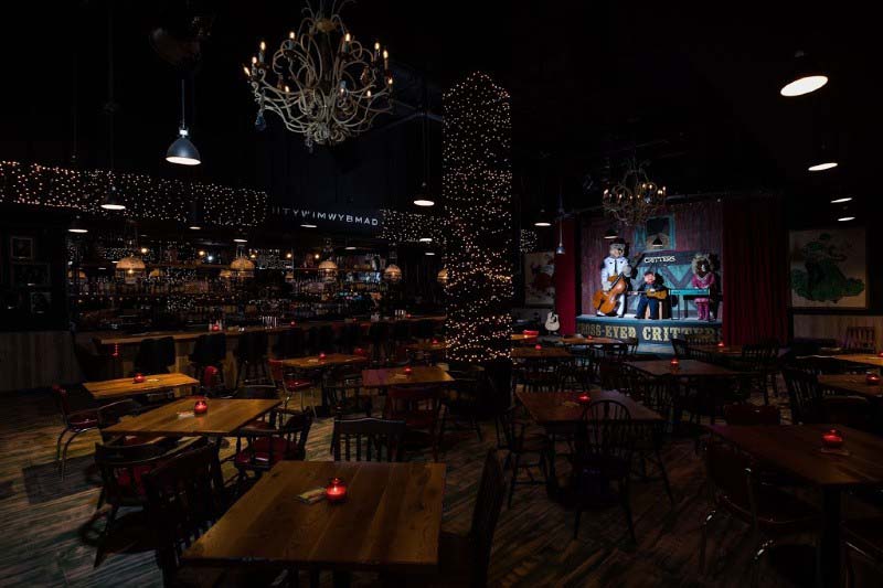 Be sure to spend an evening at Cross-Eyed Critters Watering Hole for an unforgettable karaoke experience. Image: Graduate Nashville Cross-eyed Critters at the Graduate Hotel