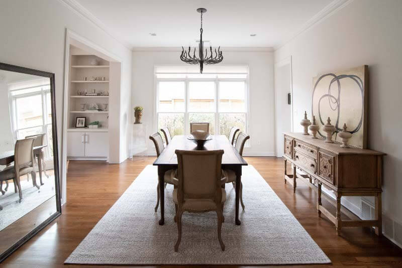 Formal dining area with massive mirror