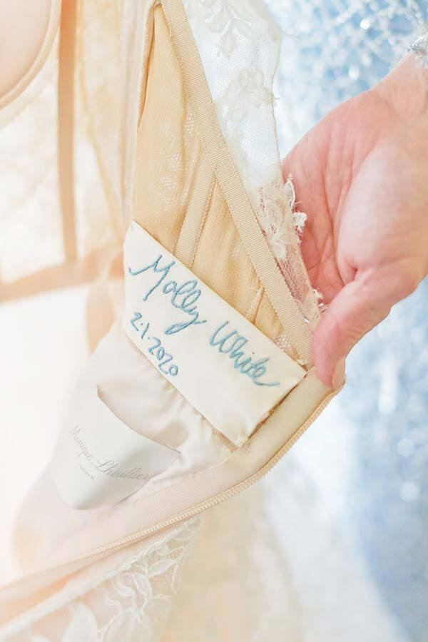 Blue stitching inside Molly's dress | Photographer: Kristyn Hogan
