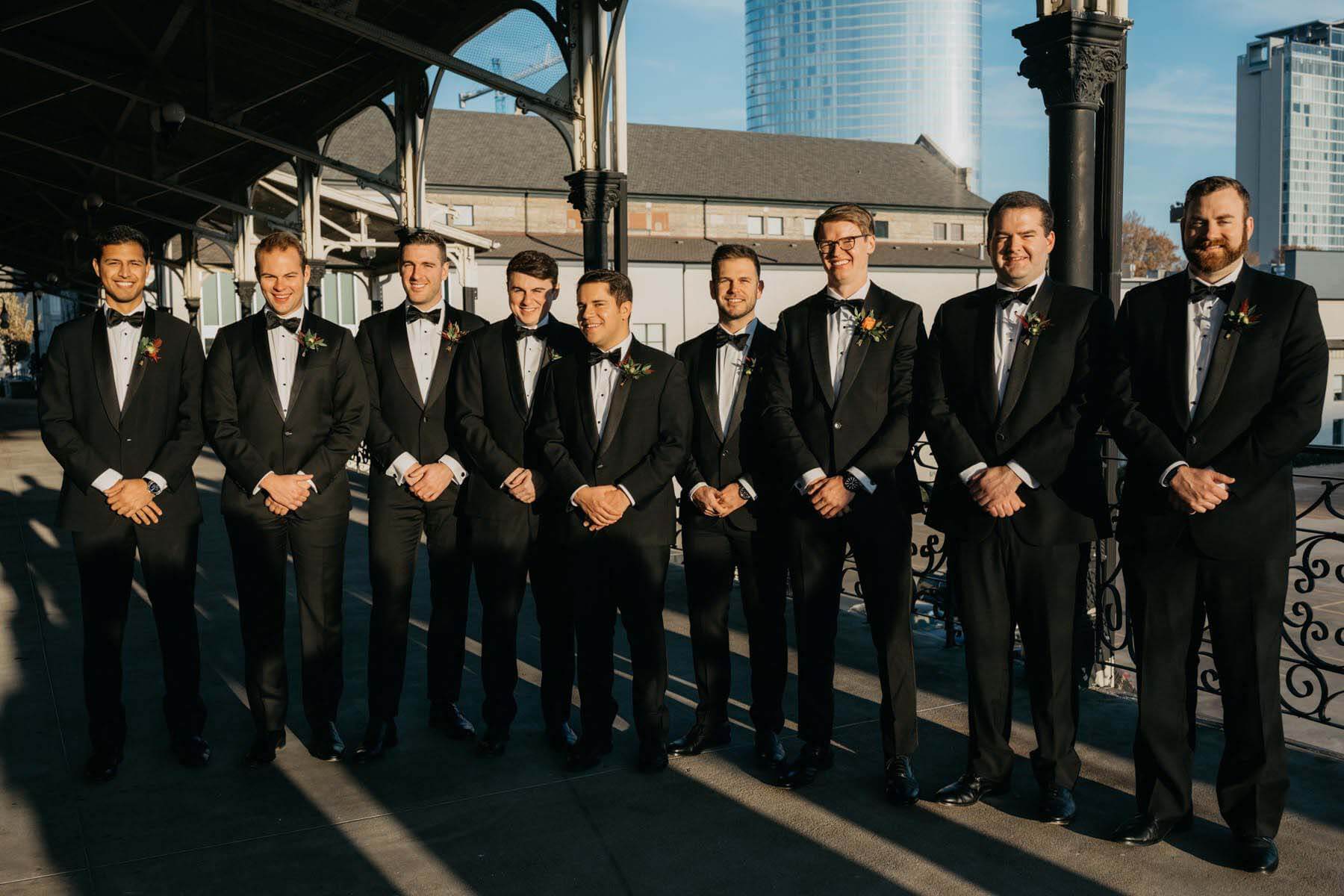Groomsmen on balcony
