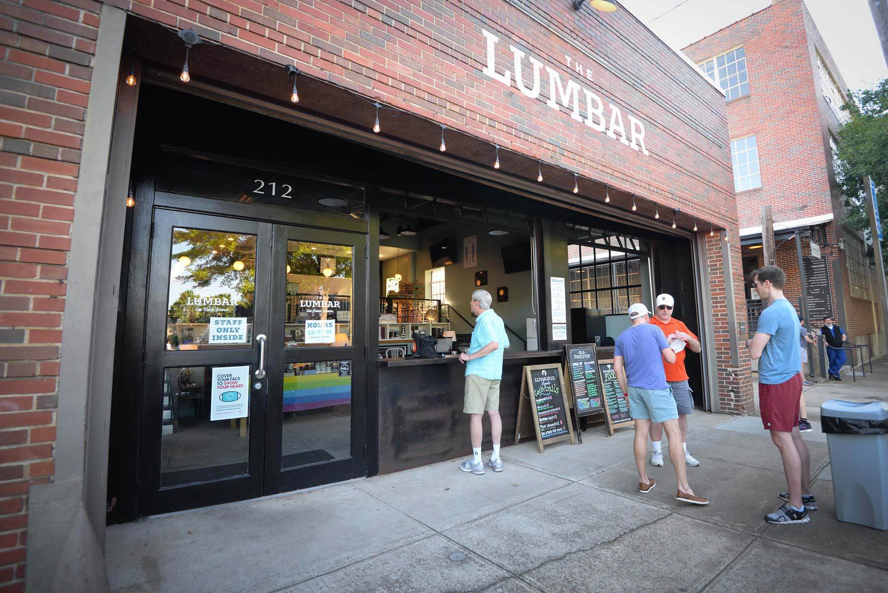 Customers gather outside The Lumbar at Pepper Place in Birmingham, Alabama.