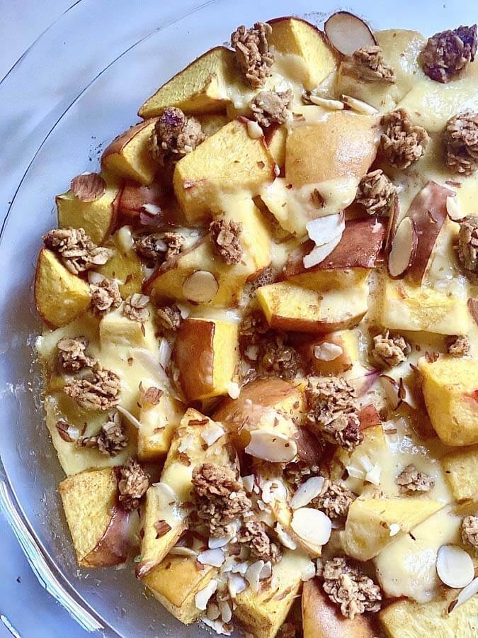 Baked Peaches with Cheesecake and granola