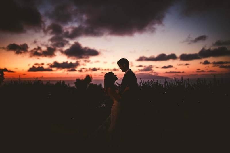 Lacy and Aaron in front of an Italian sunset