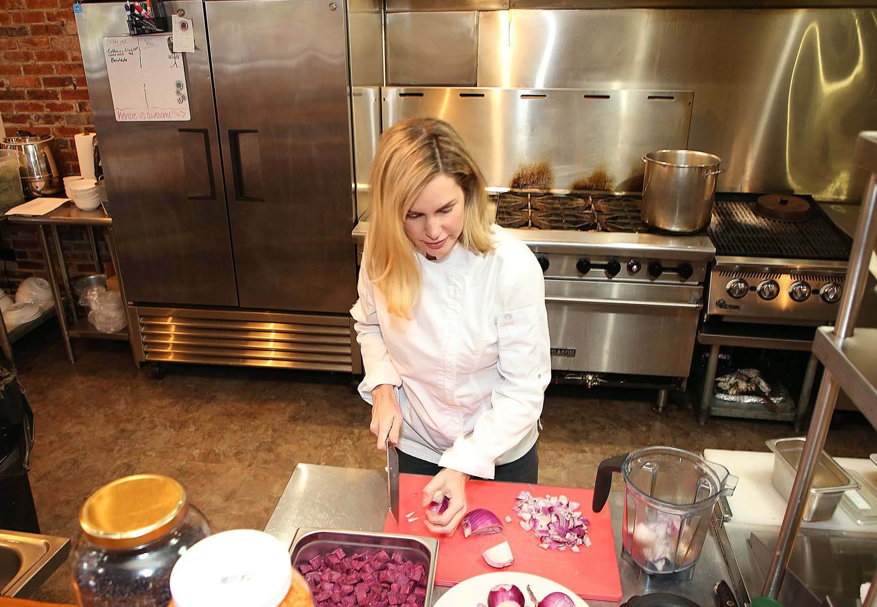 Opening its doors to the public five years ago, Pinewood serves up health-conscious food that everyone can enjoy. Mee in the kitchen, chopping onion