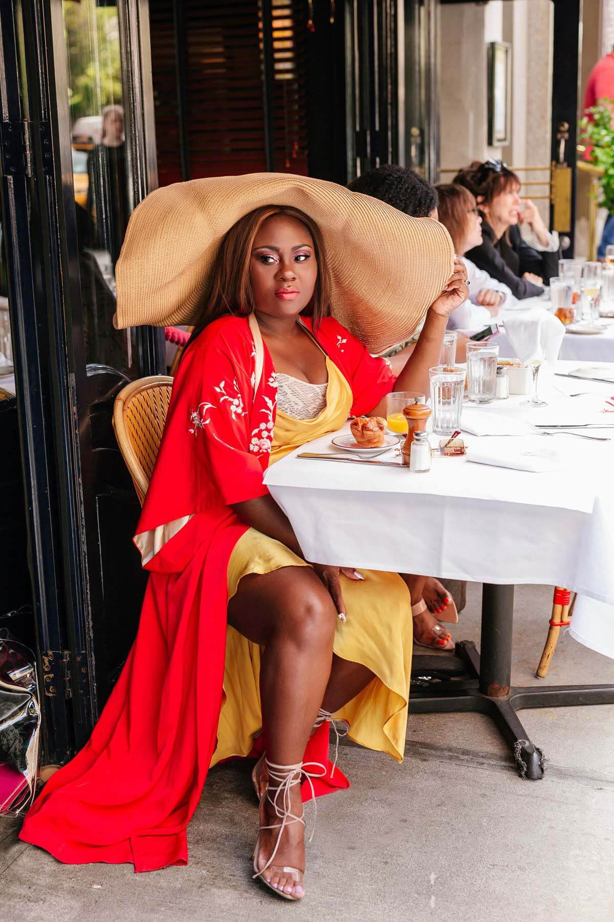 Emma posing at a restaurant