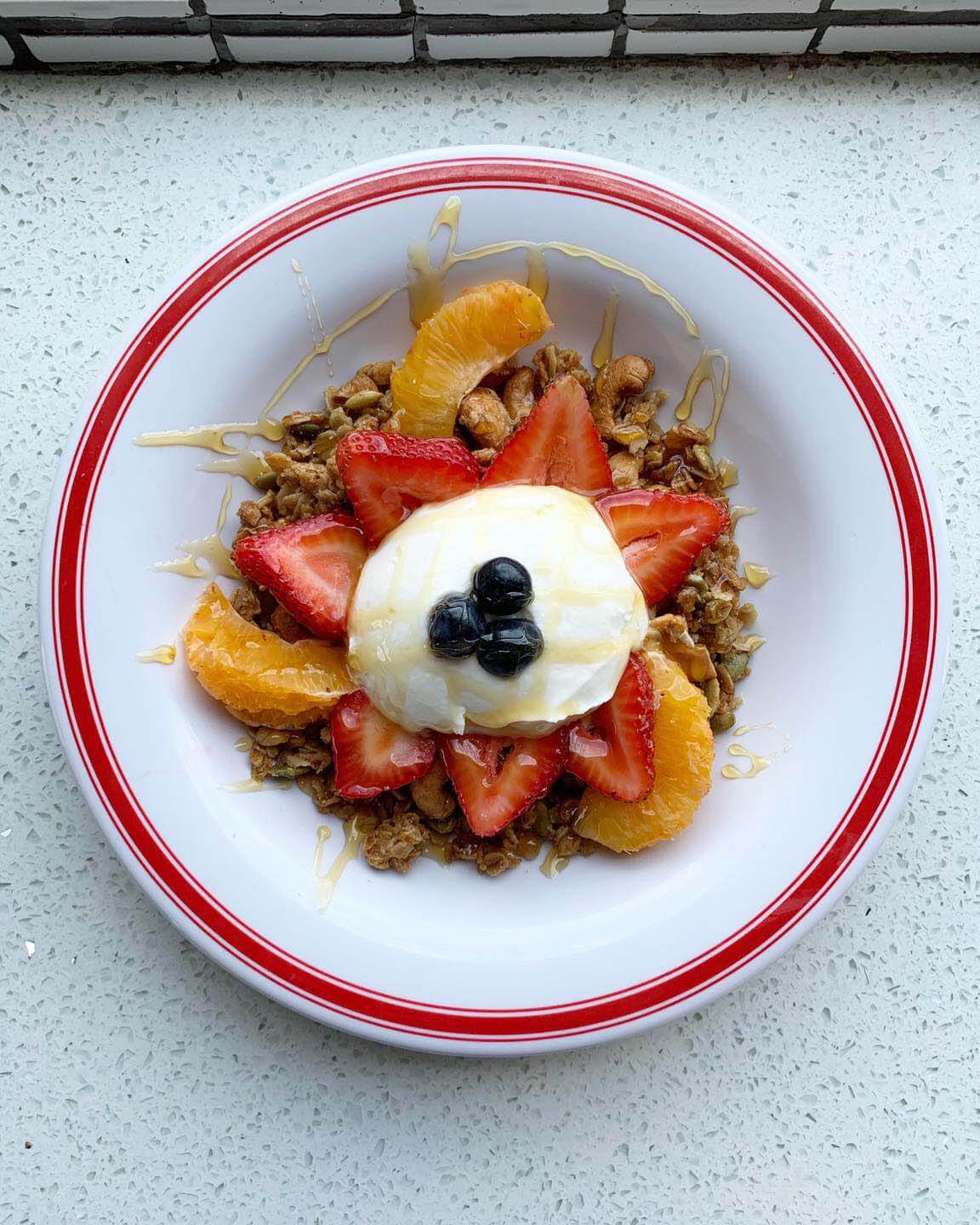 This yogurt and granola entrée is the best way to start your morning. Image: The Liquor Store Healthy menu items: yogurt and granola at The Liquor Store