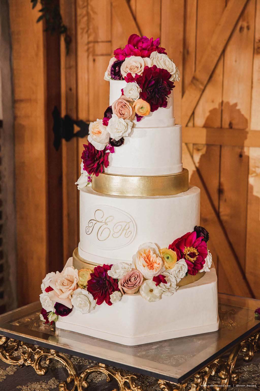 Created by Barb's Cakes, Tiffany and Wesley's cake looks almost too gorgeous to eat. Wedding cake by Barb's Cakes