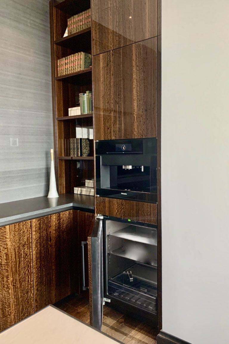 Who doesn't yearn for an office with a built-in coffee bar? In addition, this one offers a 24-inch refrigerator for snacks and a pull-out drawer for water bottles. Image: Trace Ventures Home office amenities such as a fridge and built-in espresso machine