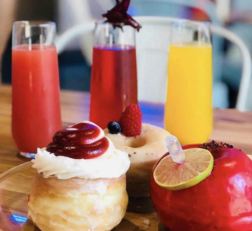 Mimosa flights and food pairing of donuts at the Donut + Dog