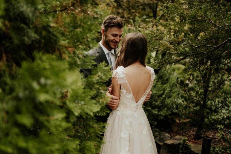 Hunter's first glimpse of his bride was nothing short of perfection. The huge smile says it all! Hunter seeing Jordan in her dress for the first time.