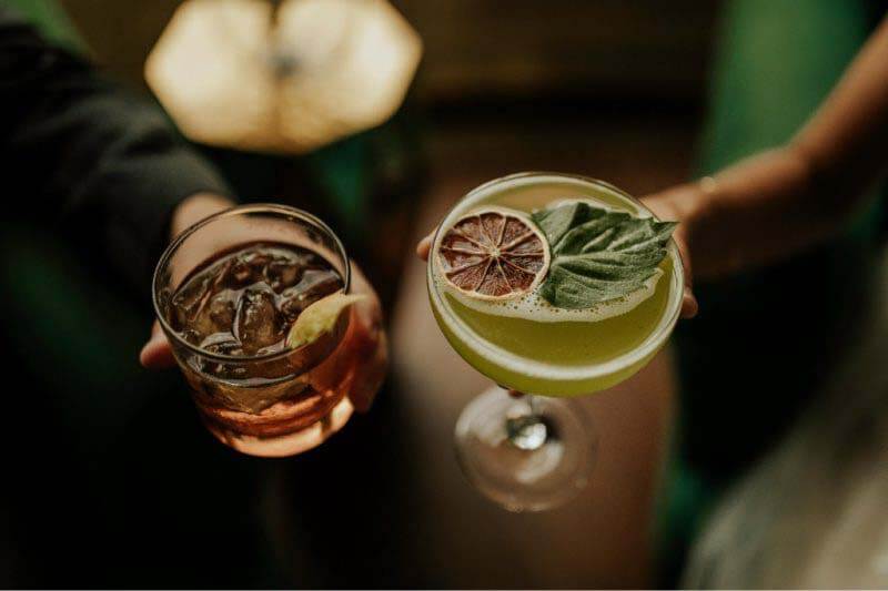While they may not have participated in any cake tastings, the bride and groom sat down with Gemaal from Aperitif Events and Cocktails to conduct a tasting for their signature drinks. "I basically told him what I liked and he crafted the cocktail right there," says Jordan. The drinks were available to guests all evening as well. Signature cocktails at a French country-themed wedding