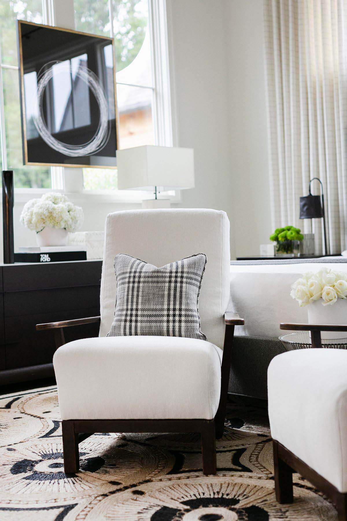 Matte black hardware, selected by specifications and living room designer Lorraine Enwright of Intuitive Dwellings, subtly anchors each room while adding a contemporary flair. Matte black living room hardware picked out by Lorraine Enwright of Intuitive Dwellings