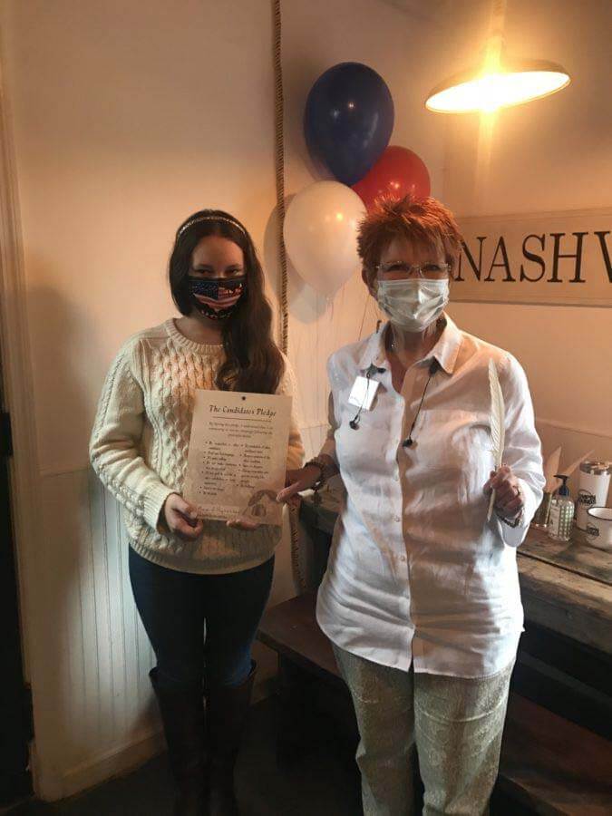 Hannah-Kate McFadden with Henderson, TN mayoral candidate Brenda Payne after signing The Candidate Pledge.