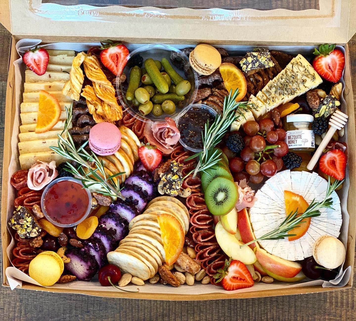 Charcuterie boxes, starting at $45, from Brie Mine | Image: Brie Mine Hostess holiday gifts: Charcuterie box from Brie Mine