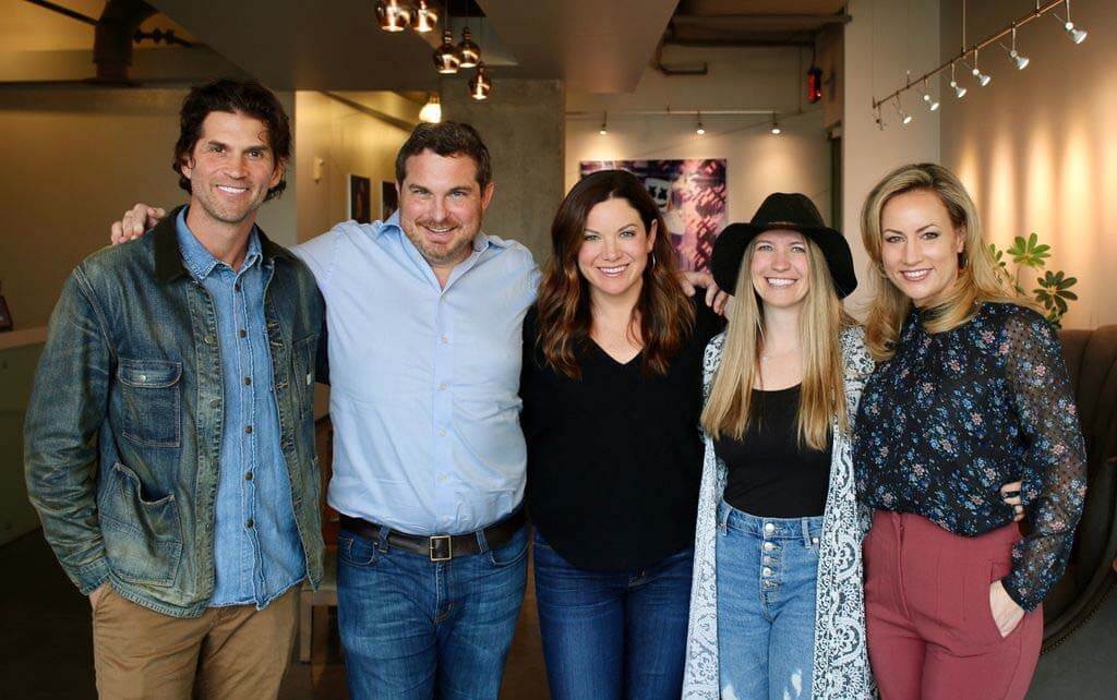 "We want to give people healthy tools and resources that will stick with them for the long term," says Laura of the Triumph Over Tragedy program. "It’s ongoing work. Mental health is like physical health; you can't work out for a week and be done." She's pictured here at a recent podcast interview with (from left to right) Onsite Foundation owner and CEO Miles Adcox, podcast hosts Hunter Kelly and Ashley Eicher, and Columbine survivor and Onsite Foundation’s Survivor Advisory Council representative Crystal Woodman Miller. Image: All Our Favorite People podcast Laura Hutfless with fellow Onsite Foundation friends and board members