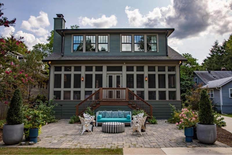 Back of house with patio area at Assad residence in Cherokee Park