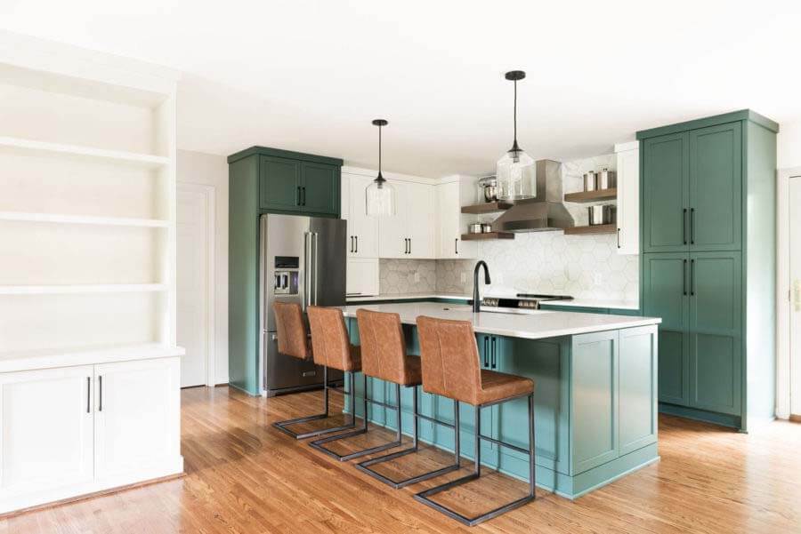 The kitchen after the renovation features plenty of storage