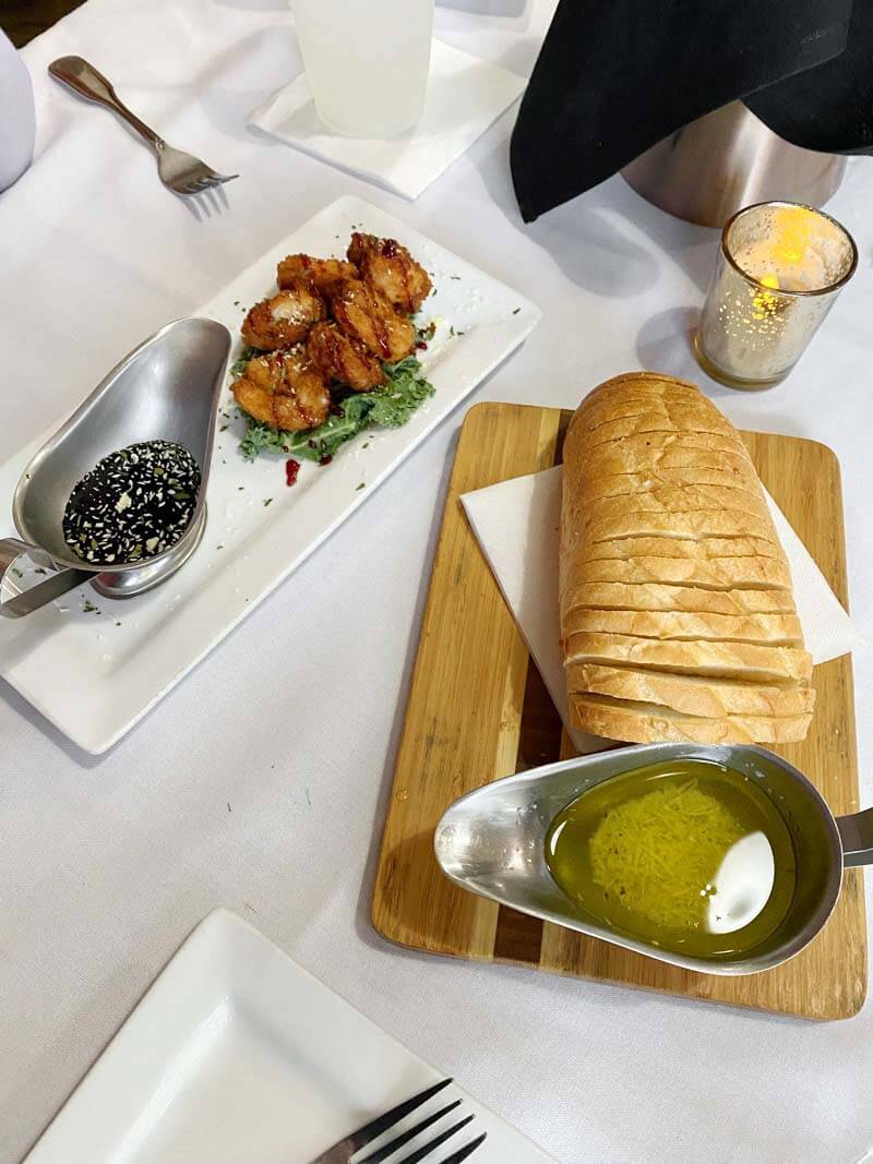 A signature appetizer at Michaelee's is the chocolate shrimp, which features six pan-sautΓ©ed shrimp encrusted with shaved white chocolate and served with imported chocolate balsamic vinegar. And be sure to try the bread with garlic-herb dipping oil. Michaelees in Blairsville, GA