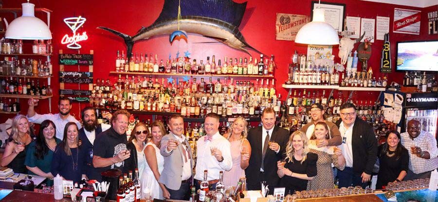 Tracie, Greg, and the wedding party at Hay Market in Louisville