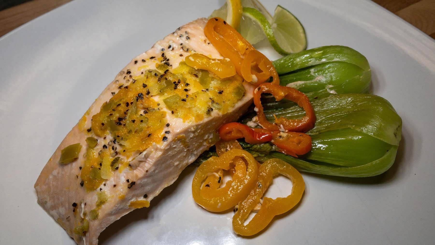 The Spicy Citrus Salmon is served with braised bok choy and peppers. Yum! Spicy Citrus Salmon from Farm and Fig Catering
