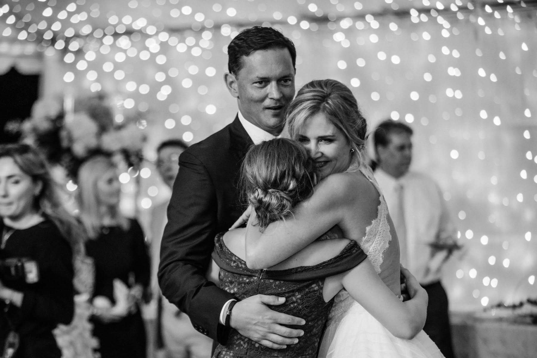 The bride and groom recall their first dance to Ray LaMontagne’s "You Are The Best Thing," during which Allison's middle daughter, Sophie, busted in to show her love and support. "She's super attached to Mark," says Allison. "It was awesome that she was a part of our first dance." Allison's daughter cuts in on the first dance