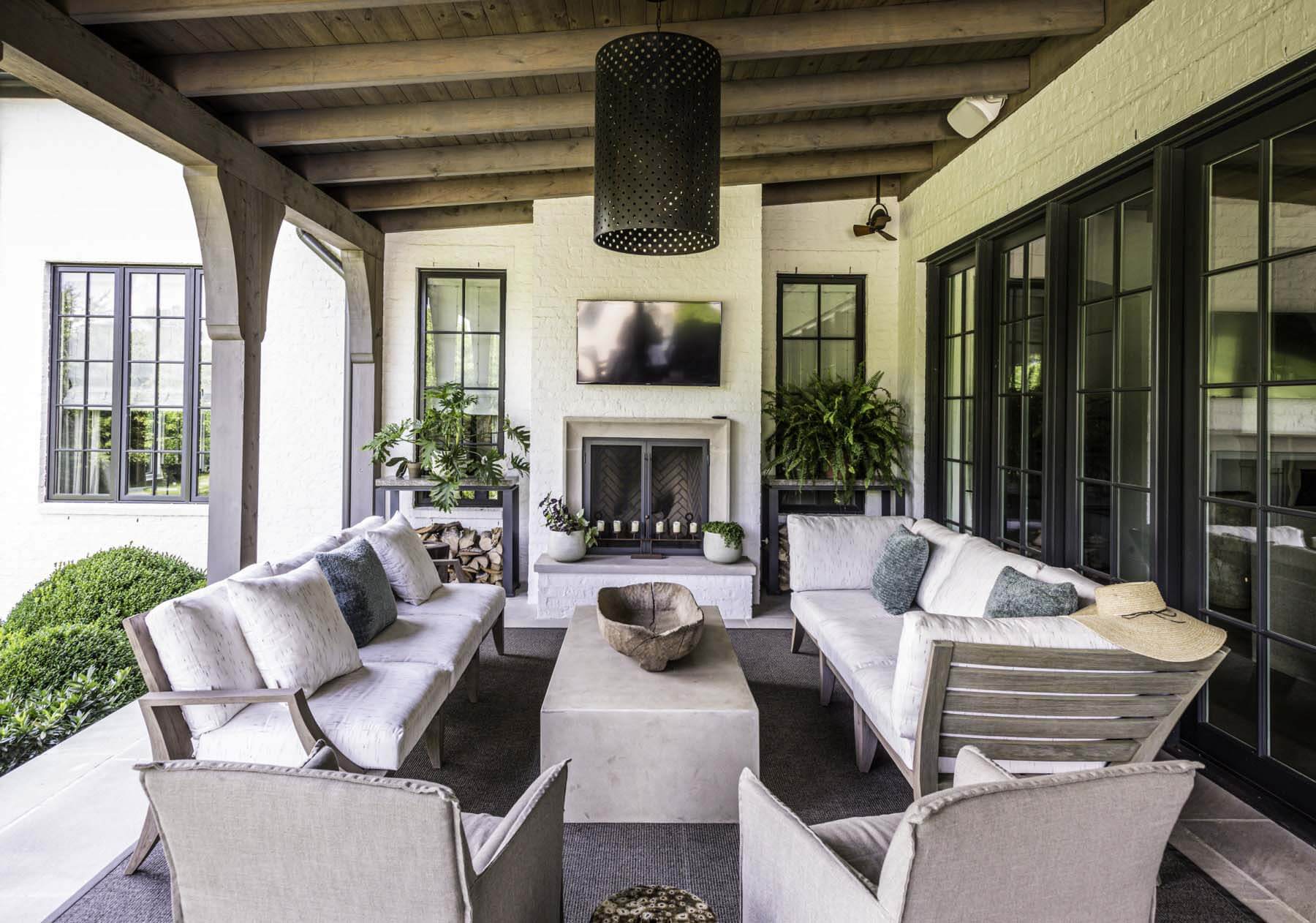 An outdoor covered porch at the Looney's house in Forest Hills