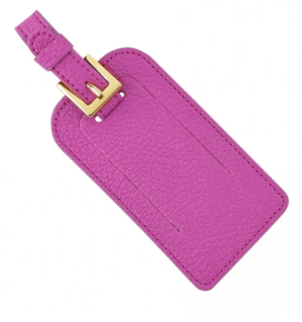 Luggage tag, $35, at Epergne | Image: Epergne Pink luggage tag at Epergne