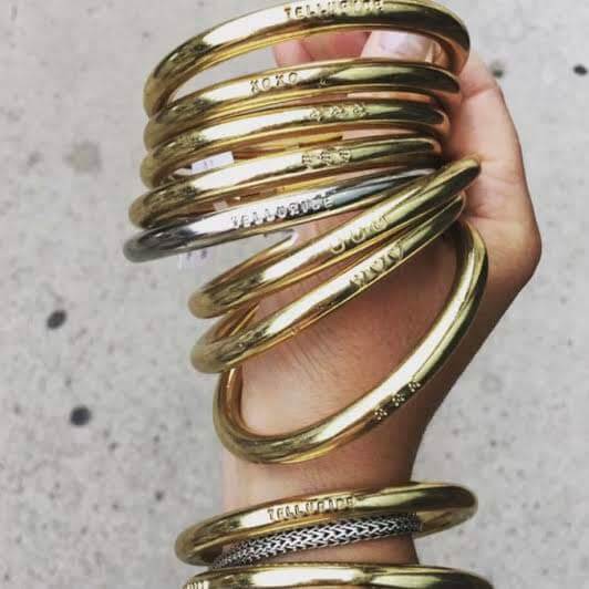 Stack of brass bangles with customization