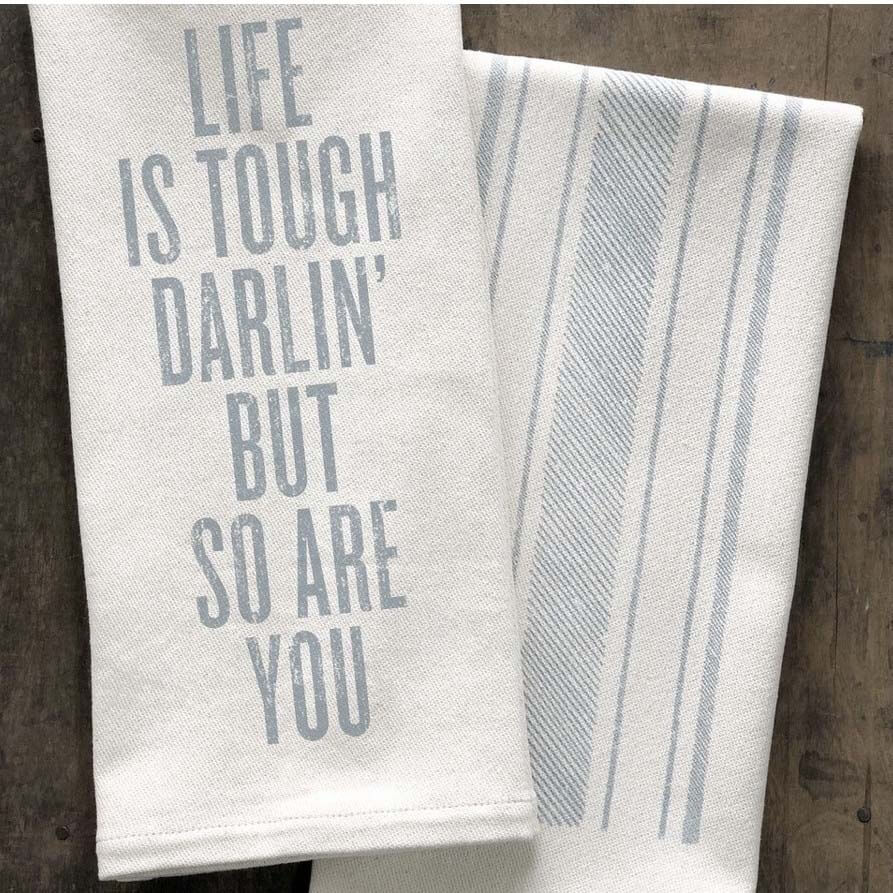 Order these towels by December 18 for on-time Christmas delivery. Tea towels that read "Life is tough darlin, but so are you"