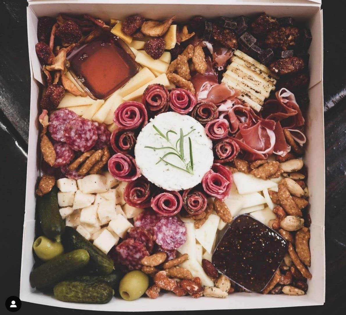 A Tasty Tray cheese board and charcuterie tray