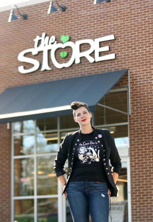 Courtney posing in front of The Store