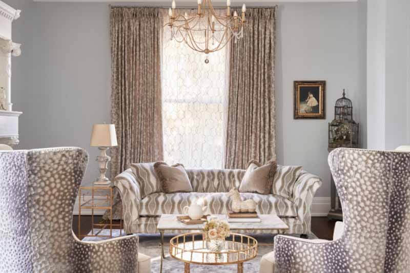 Close-up of couch and chairs in parlor
