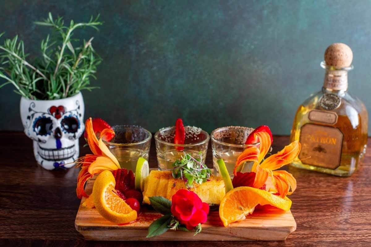 We suggest ordering the Patrón tequila flight paired with frutas callejeras from Noche Mexican BBQ. Image: Johanna Hribal of Frames + Letters Photography Patrón flight from Noche Mexican BBQ