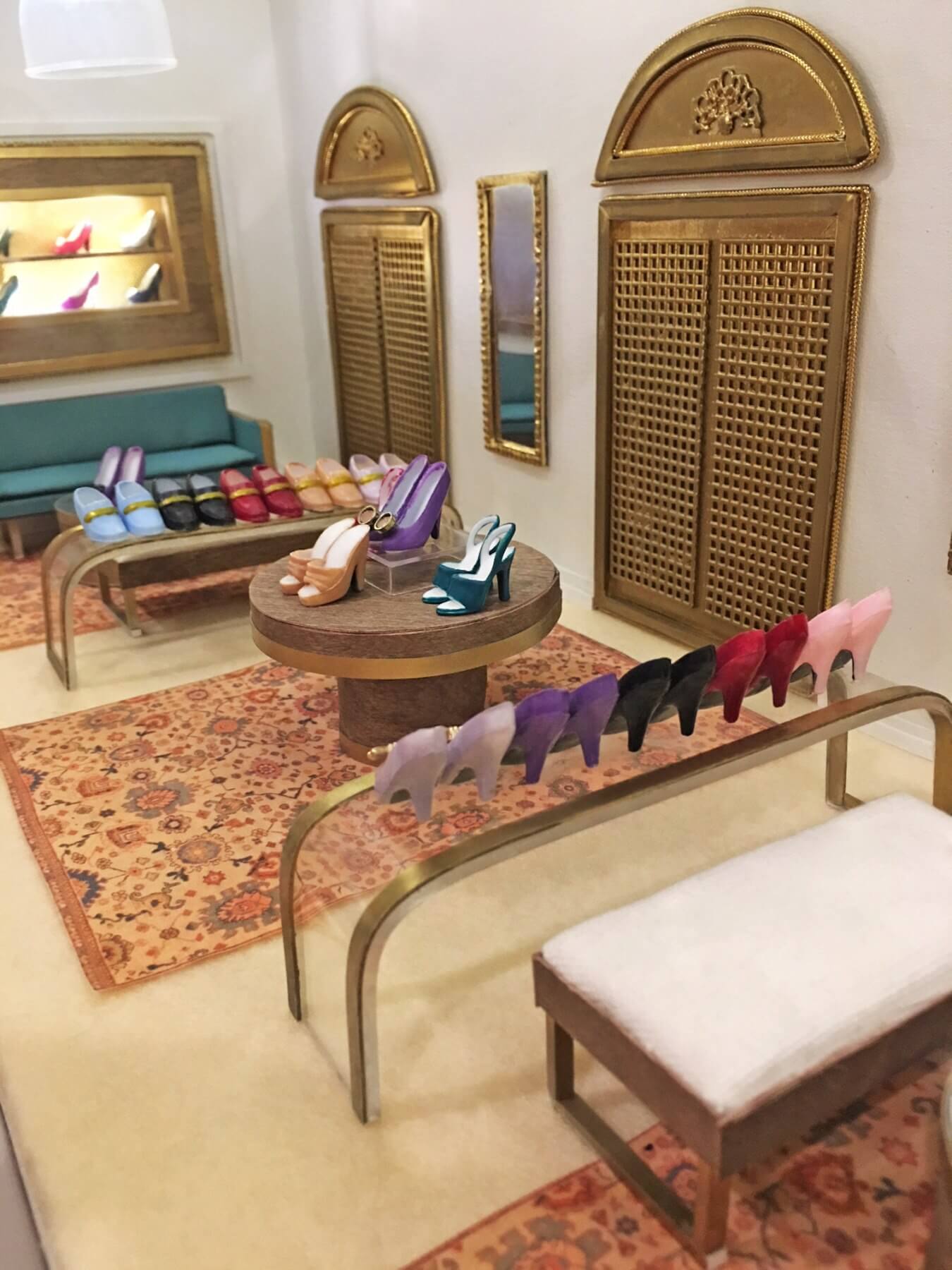 It's all in the details — from the tiny shoes to the furniture and even the rugs. Close-up of Kim Willson's cigarette machine art