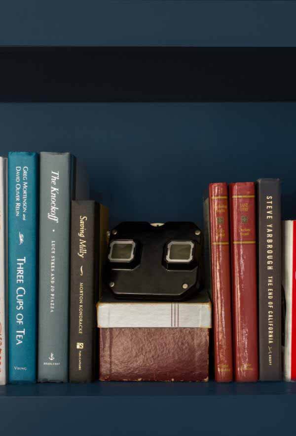 Jessica Davis design vignette with vintage books and camera