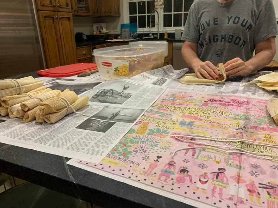 Jere Myers rolling tamales in her kitchen