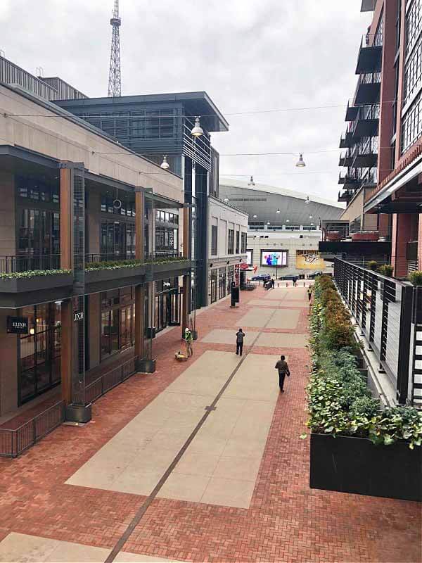 With special care taken to complement the historic downtown district, Fifth + Broad offers a charming shopping and dining destination. Interior walkway at Fifth+ Broad