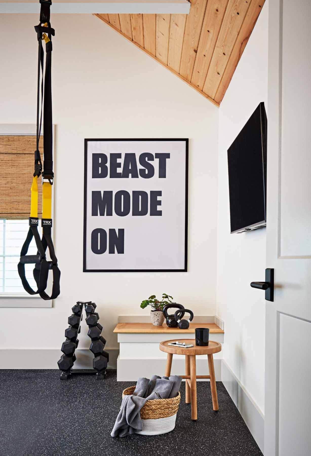 "Beast Mode On" print in home gym